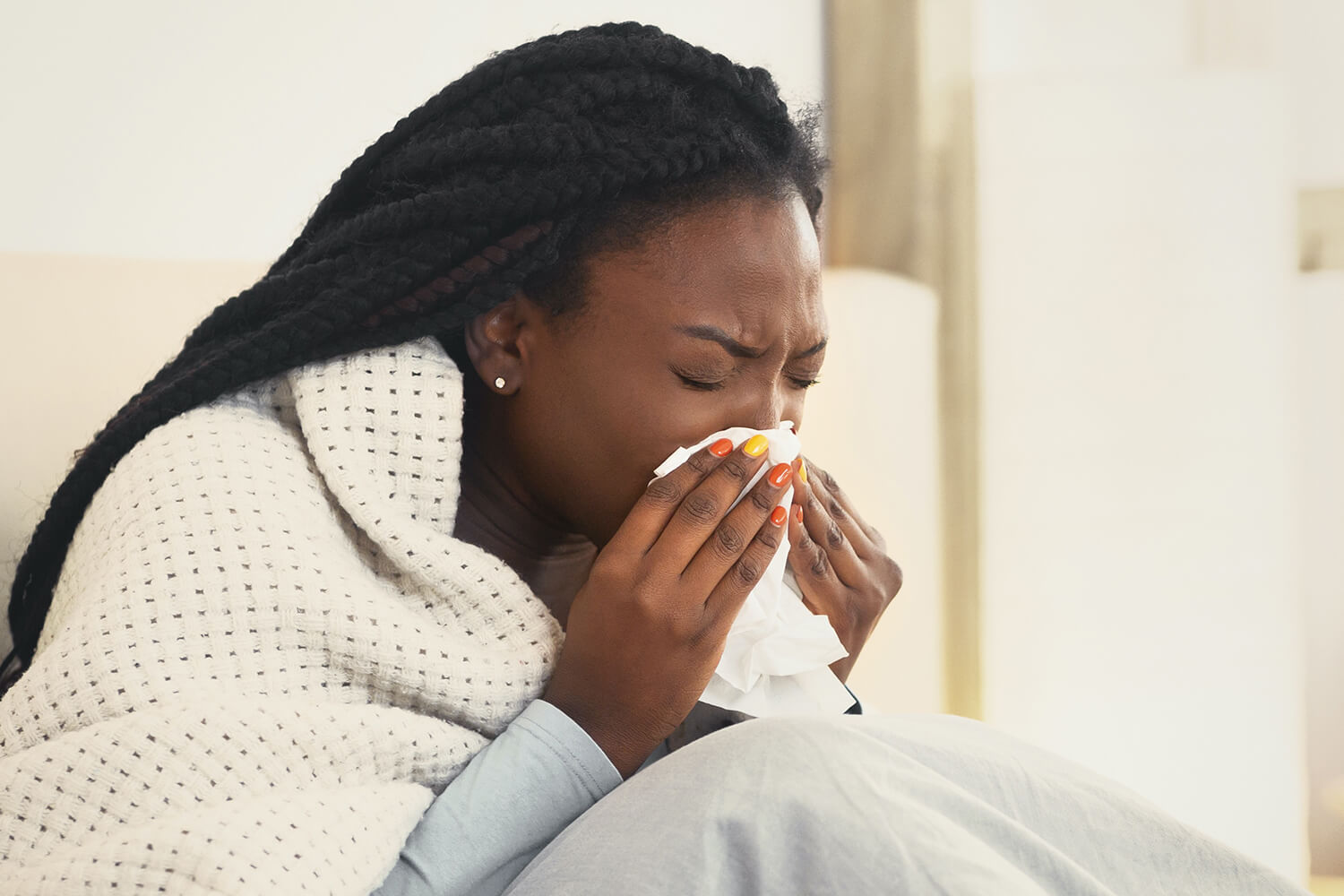 woman-blowing-nose